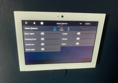 White Control4 Touchpad On Wall Displaying Master Bedroom Lighting